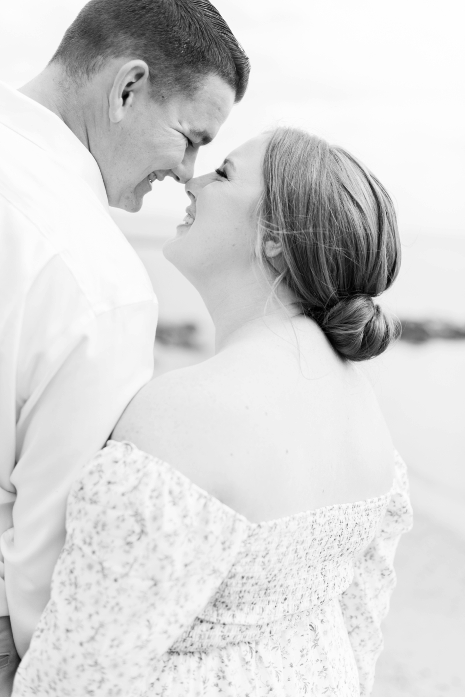 bride and groom almost kiss during engagement session with virginia wedding photographer