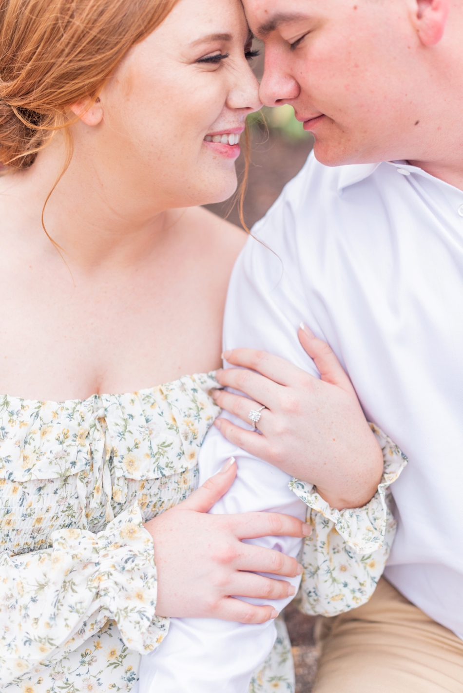 engaged couple look at each other with wedding photographer in Virginia